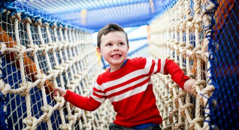 Boy on the Soft Play ropes at Ards Blair Mayne