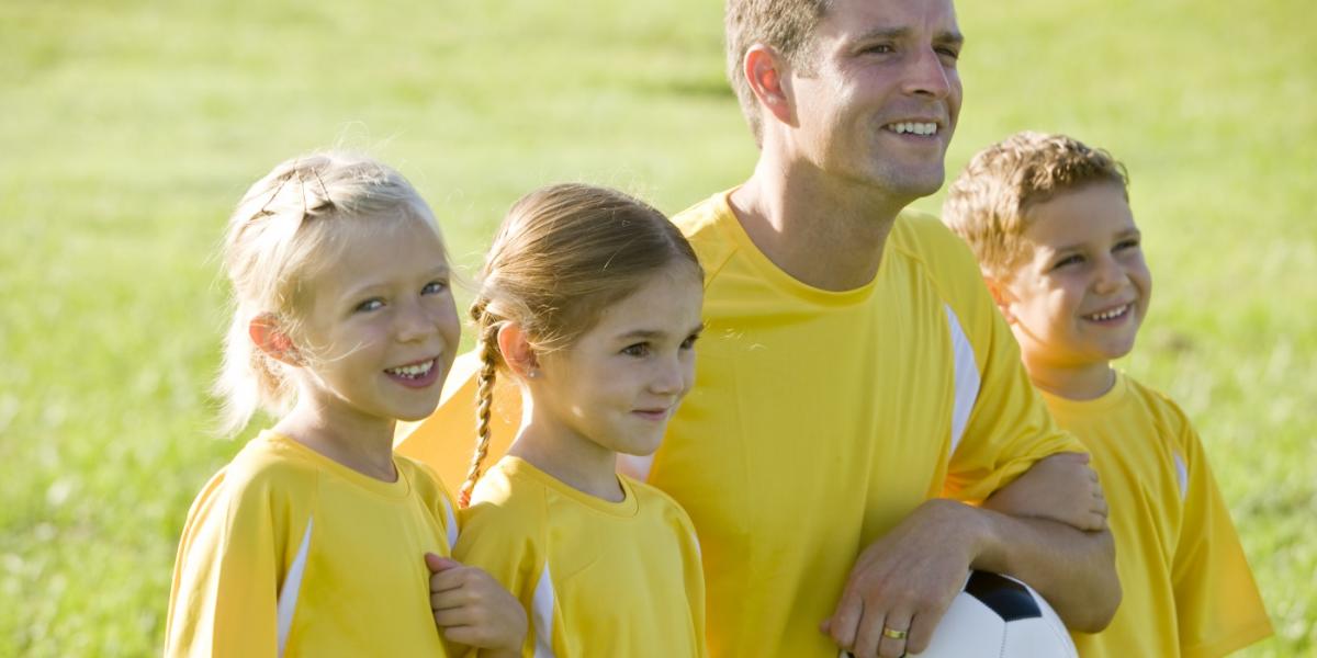 football coach with kids