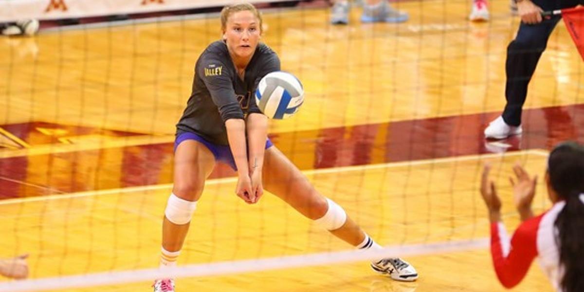 girl playing volleyball