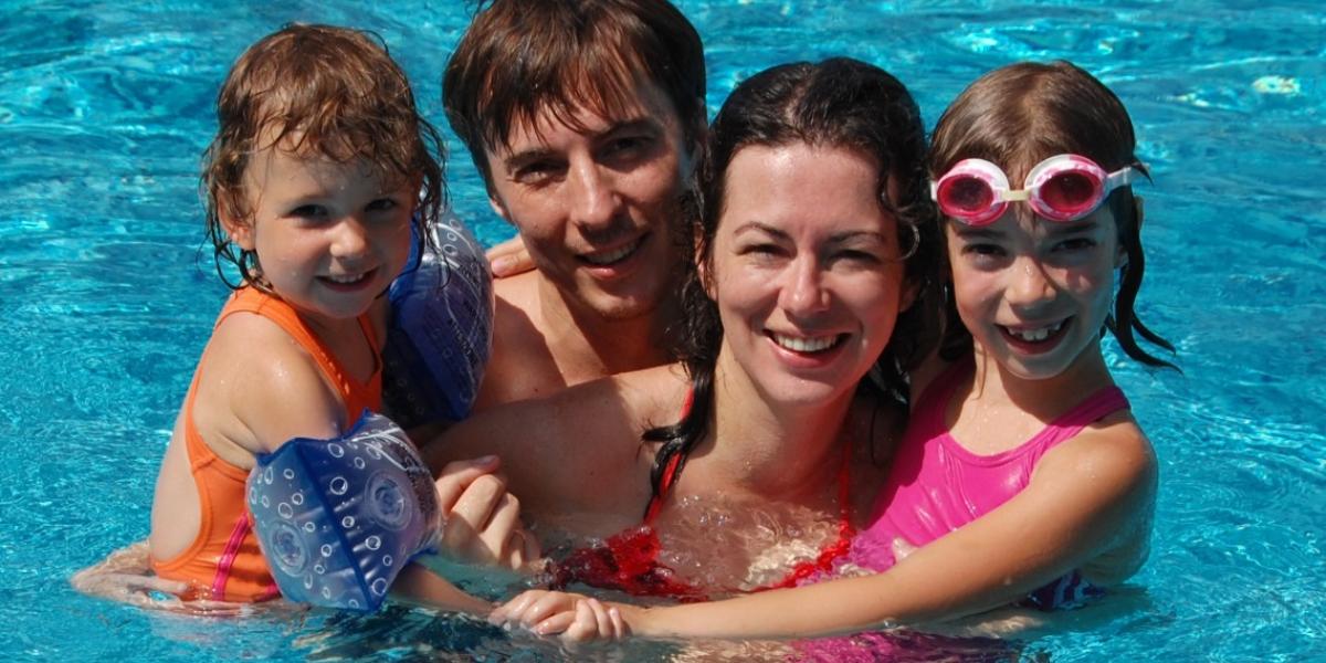 Photo of family in a pool