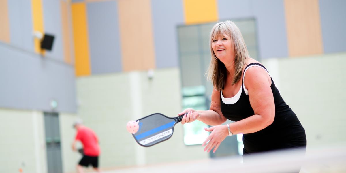 Woman playing Pickleball